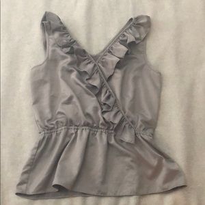 Green ruffled peplum blouse